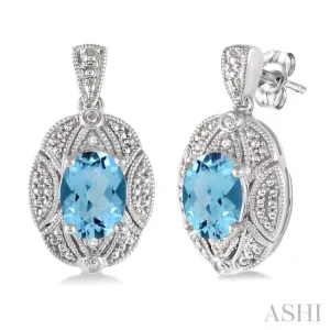 8x6 mm Oval Cut Blue Topaz and 1/50 ctw Single Cut Diamond Earrings in Sterling Silver 8x6 mm Oval Cut Blue Topaz and 1/50 ctw Single Cut Diamond Earrings in Sterling Silver