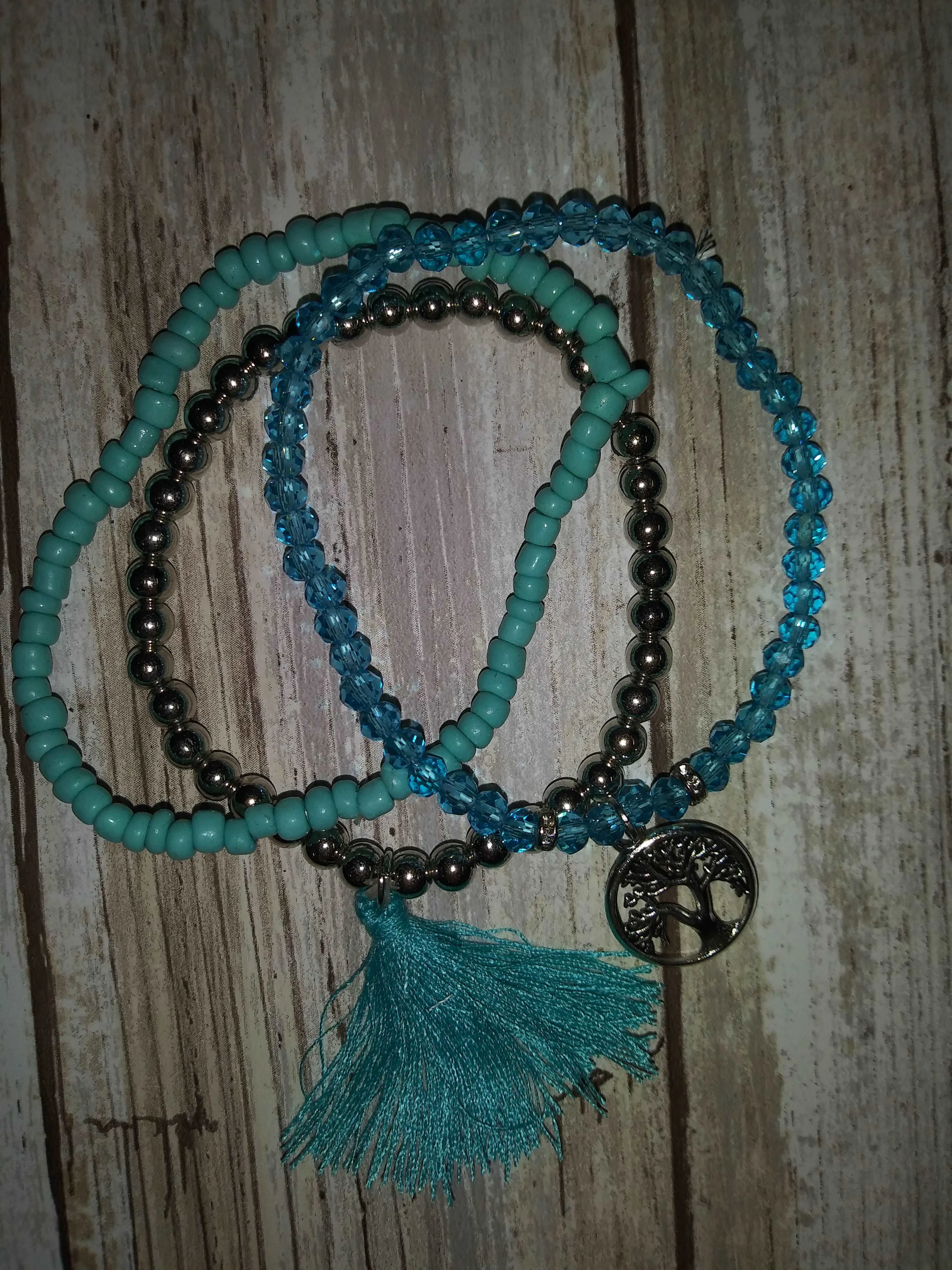 Beaded Bracelet W/ Charm & Tassel