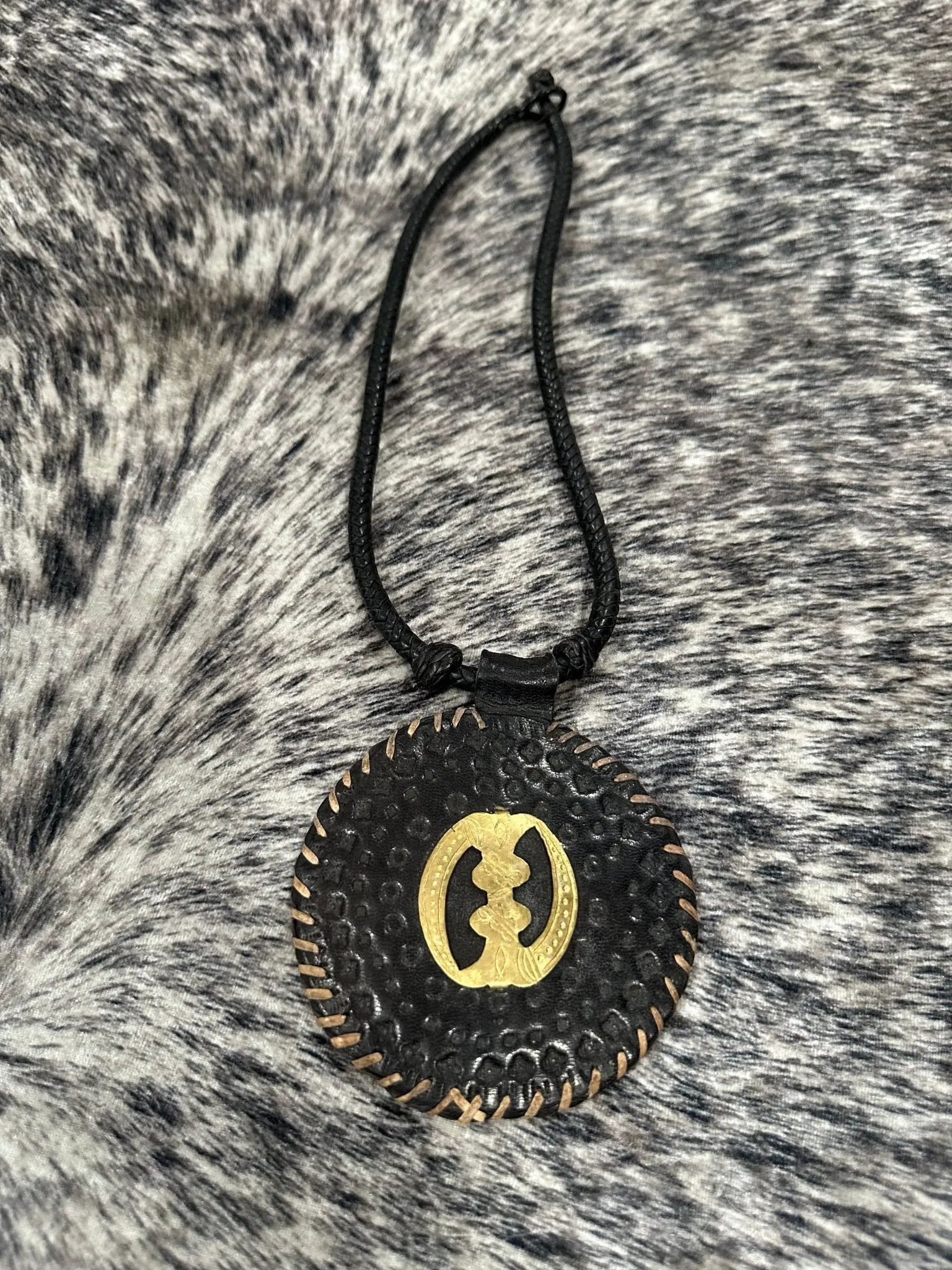 Berthe Unisex Leather and a brass Necklace