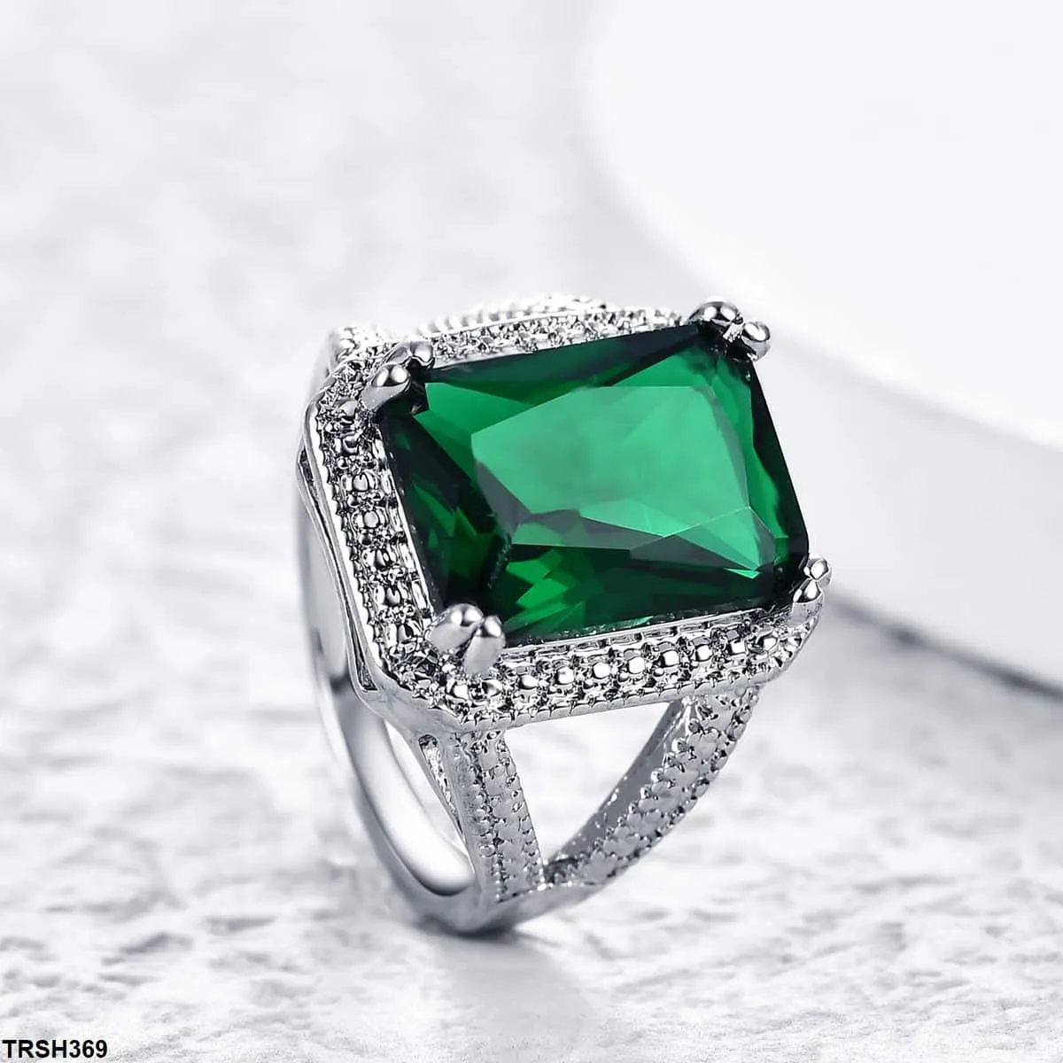 Emerald Step Zircon Studded Ring