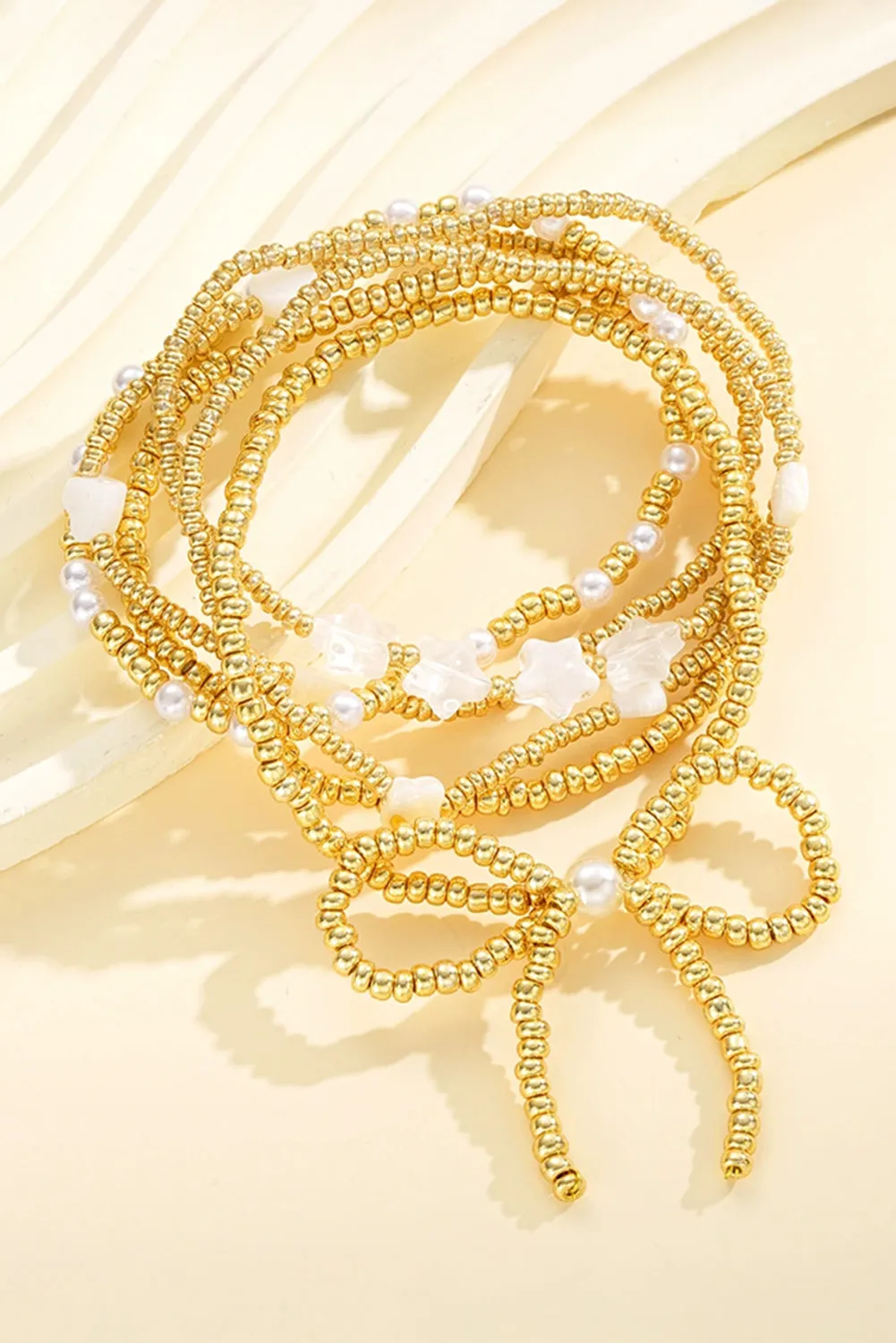 Gold Bow Stretch Beaded Bracelet Set