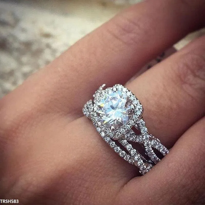 Pen-Collin Couple Engagement Zircon Ring