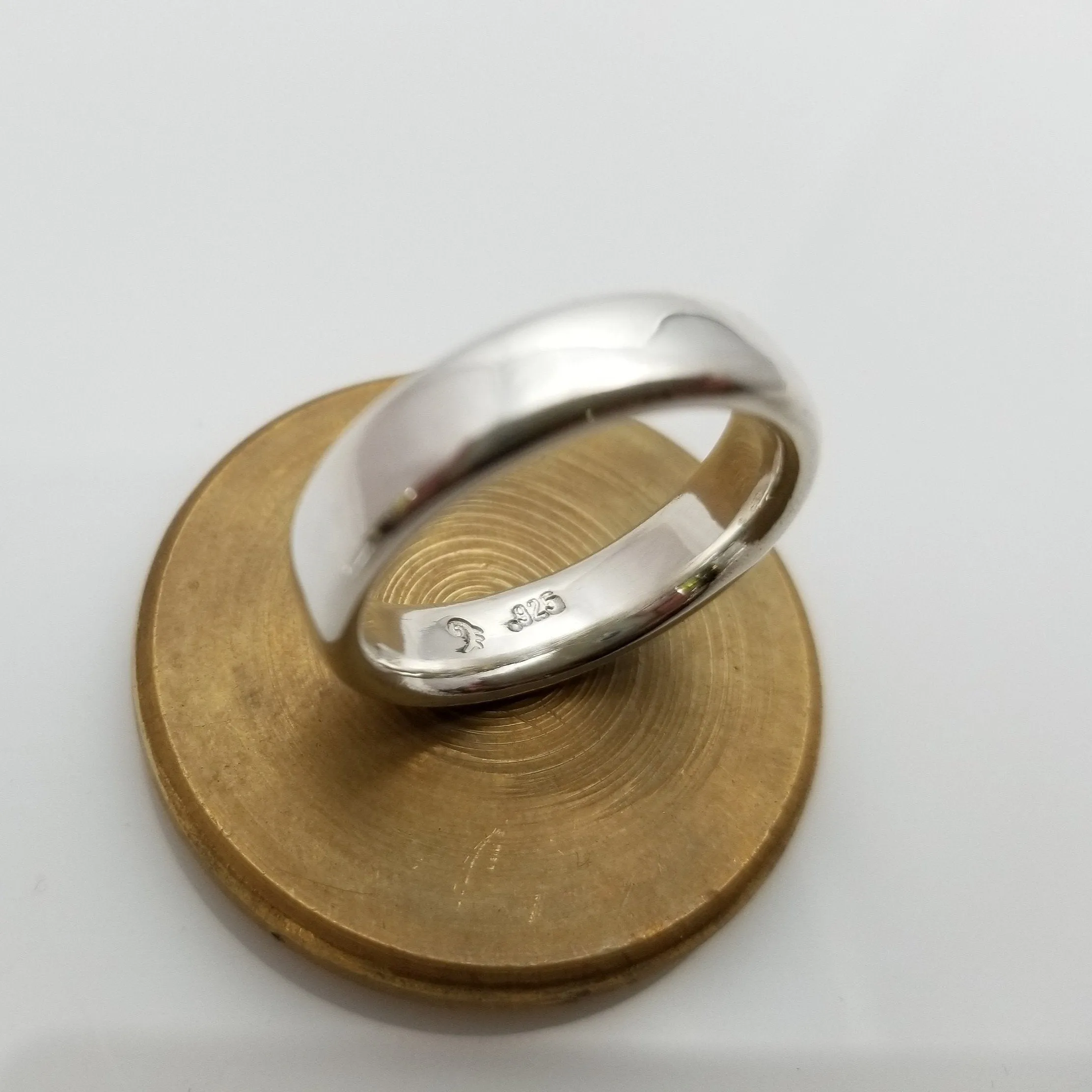 "New Moon Ring, Timeless Elegance: The Classic Solid Silver Wedding Band"