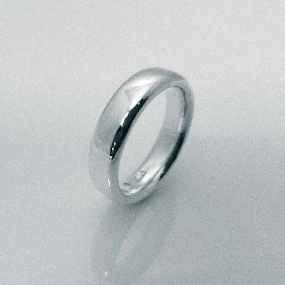 "New Moon Ring, Timeless Elegance: The Classic Solid Silver Wedding Band"