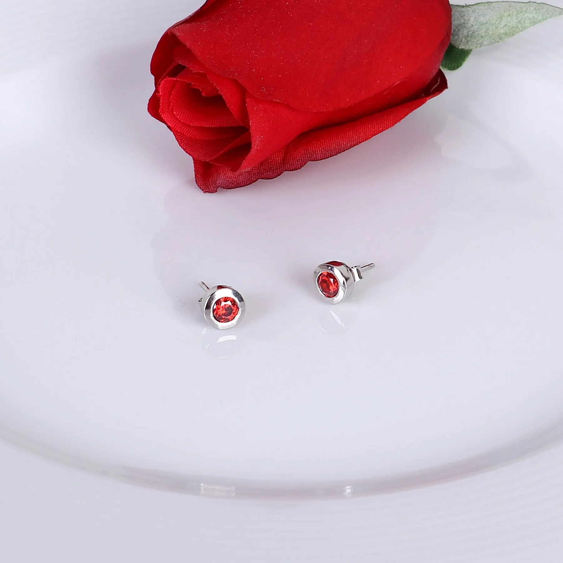 Round Ruby Bezel CZ Sterling Silver Stud Earrings