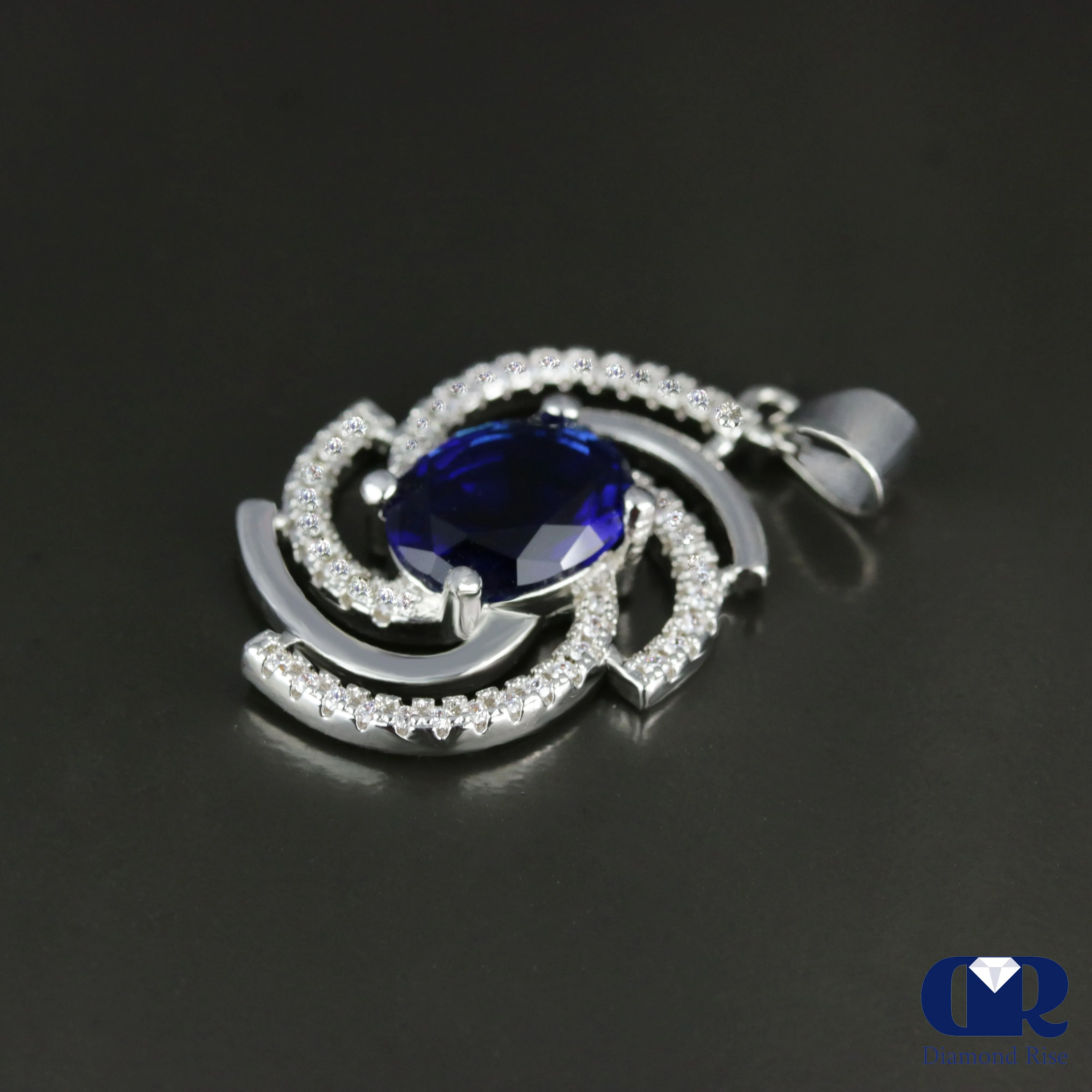 Women's Oval Sapphire & Diamond Pendant In 14K Gold