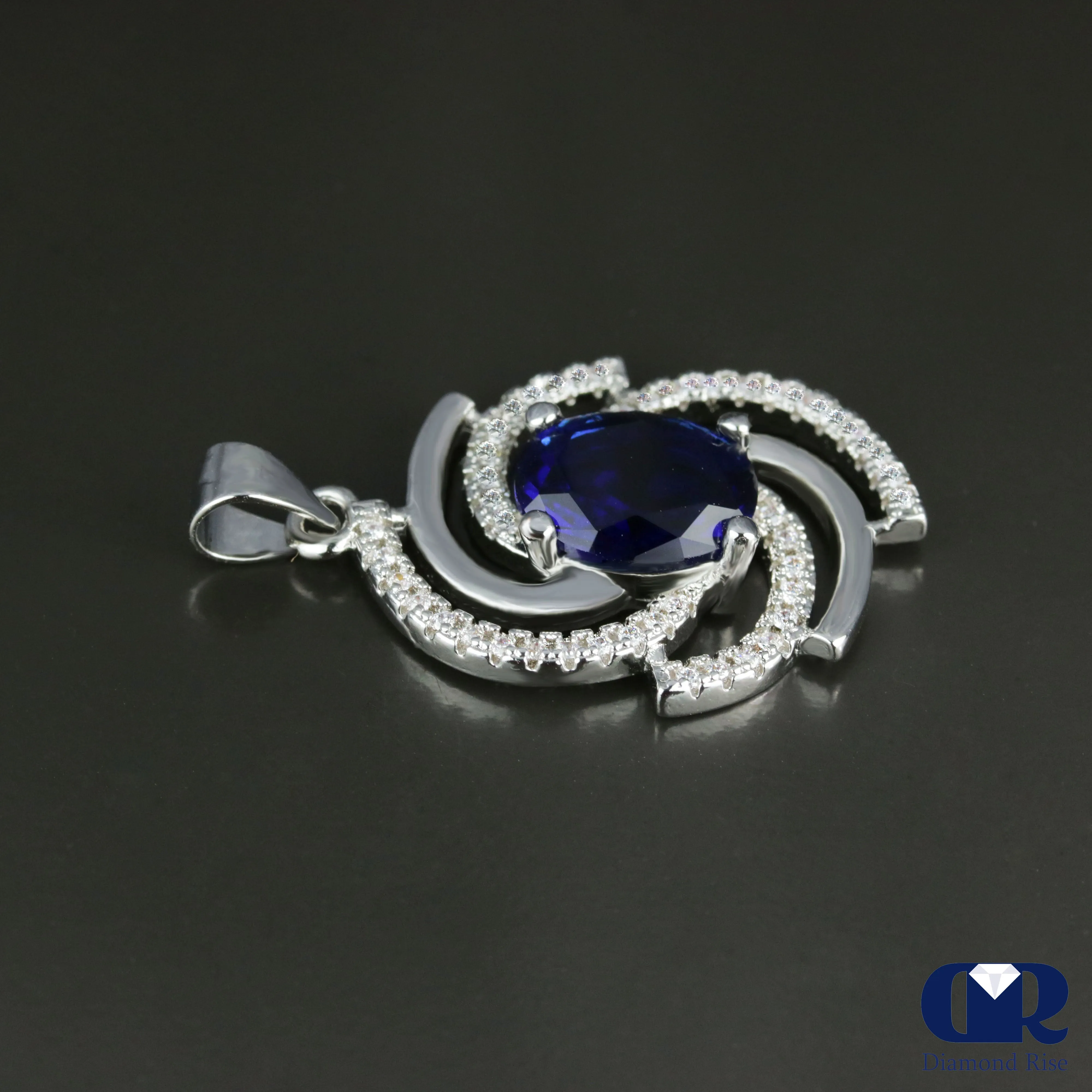 Women's Oval Sapphire & Diamond Pendant In 14K Gold