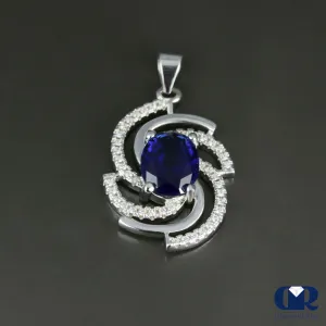 Women's Oval Sapphire & Diamond Pendant In 14K Gold